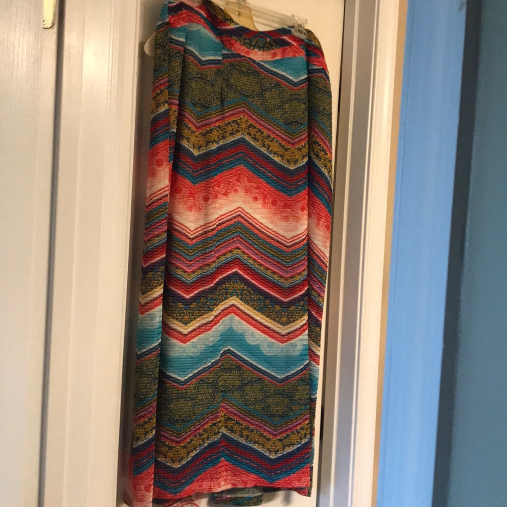 Fits larger than size at waist, length exact.